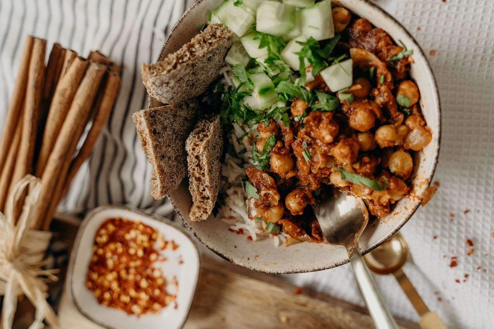 Bowl of chickpeas, rice, and vegetables, fiber-rich foods for gut health