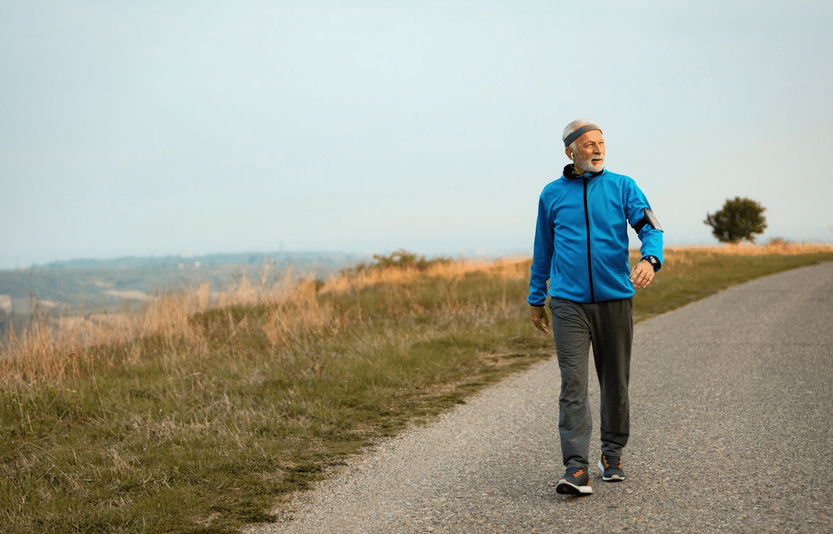 Older adult jogging outdoors at sunrise, representing healthy aging and metabolic health