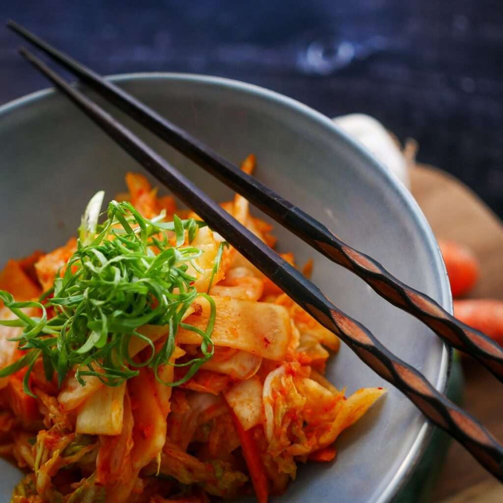 Fermented probiotic foods like kimchi in this prebiotics vs probiotics guide