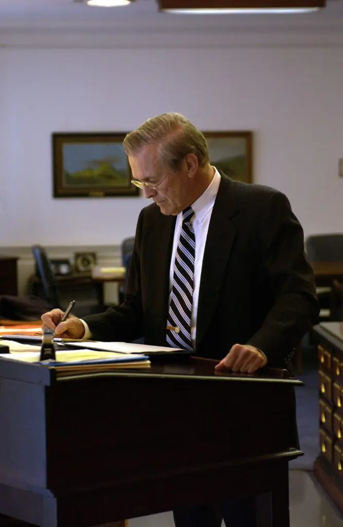 Donald Rumsfeld working at a stand-up desk
