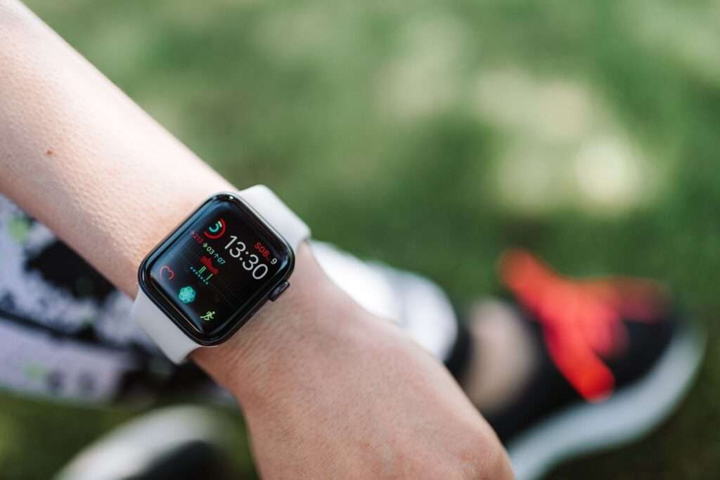 Fitness tracker showing a heart rate in the zone 2 cardio training range